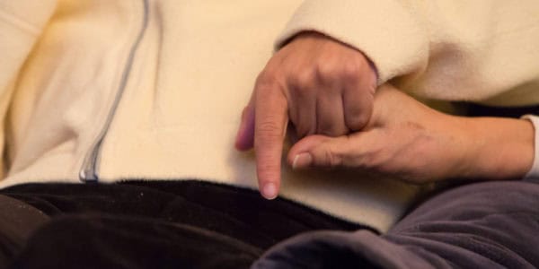 Two hands holding.