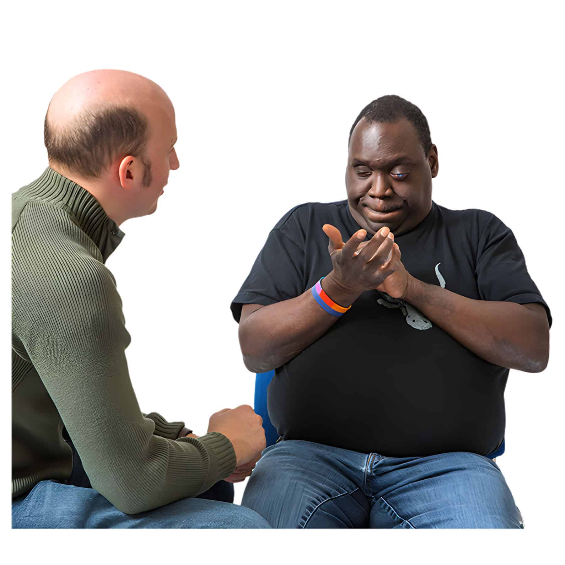 A man uses sign language to communicate with another