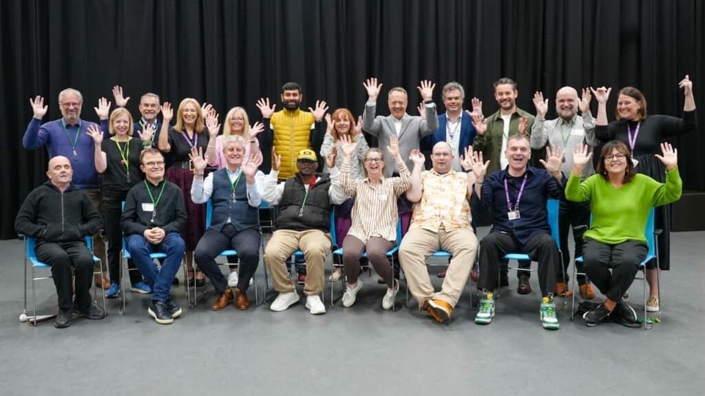 A group of people waving