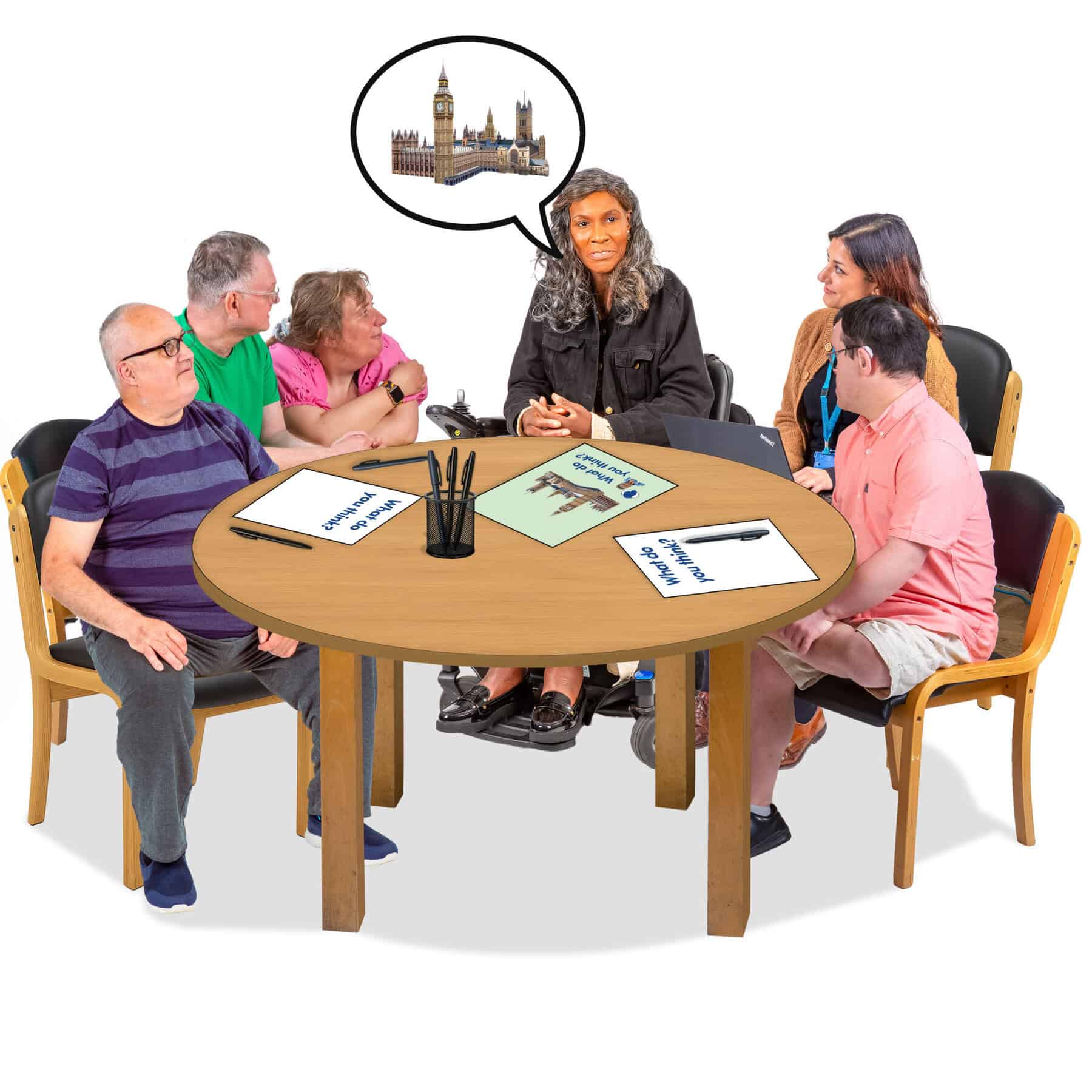 People talk around a table. The central figure is talking about Parliament