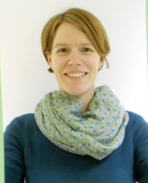 Close-up of Jenny Wheatcroft, a white woman with short hair, against a white background.