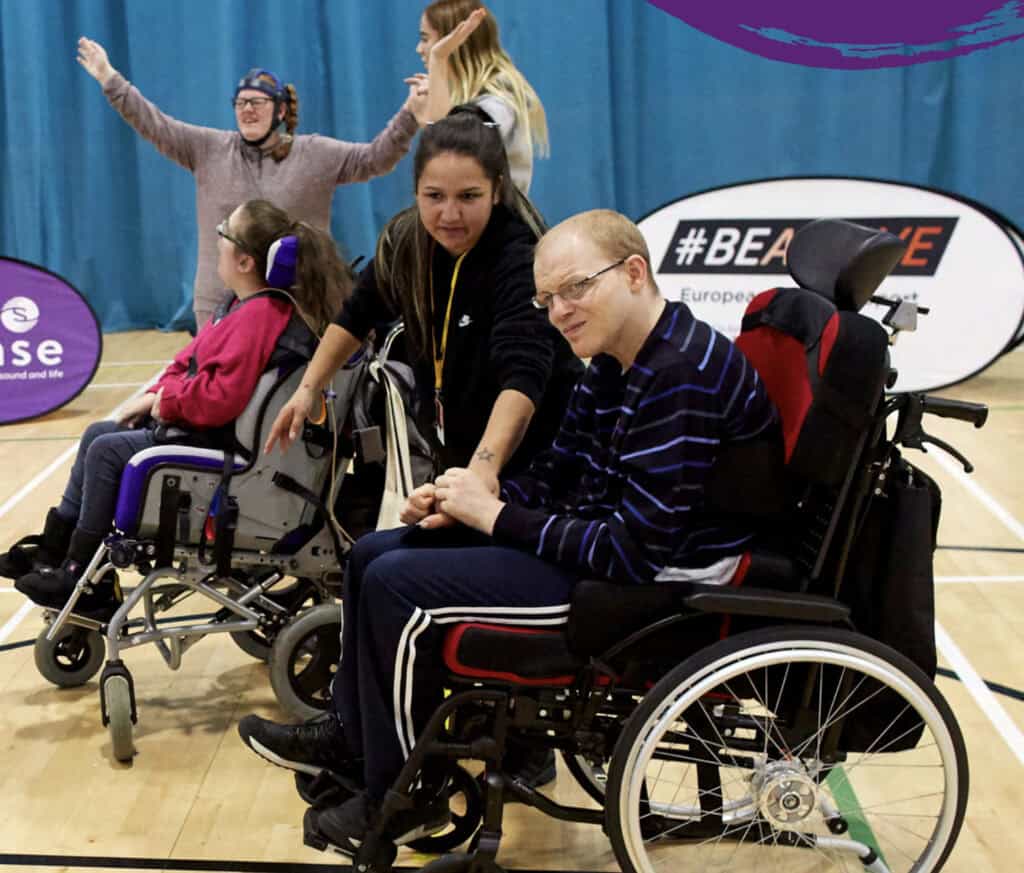 A group of people in a gymnasium