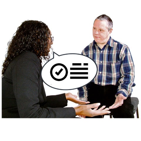 A woman asks a man a question