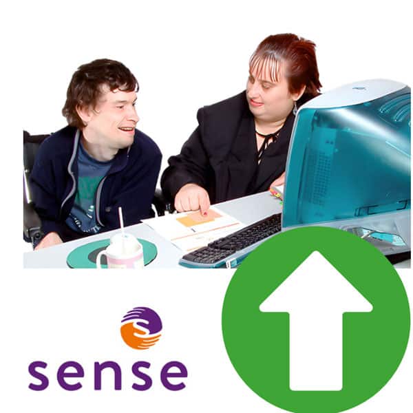 2 people in front of a computer alongside an arrow pointing up