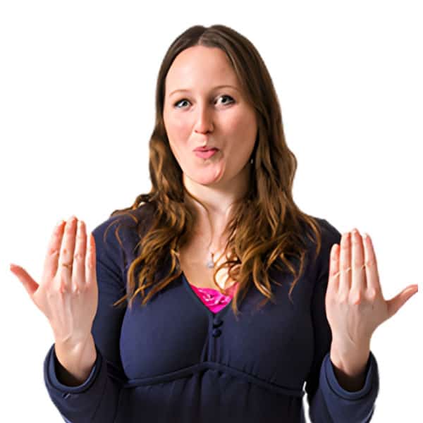 A woman welcomes the audience